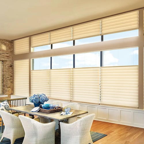 Rolling blinds installed in bright west facing room