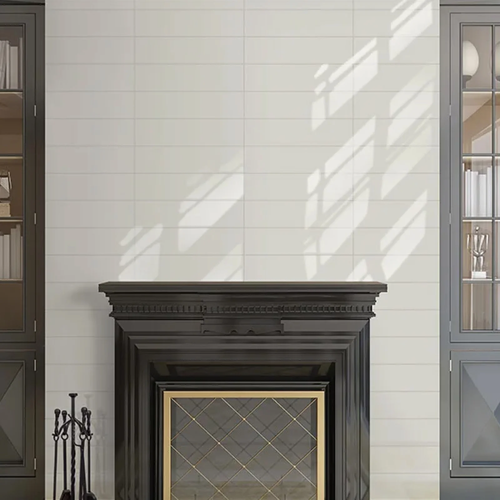 White subway tile installed around fireplace