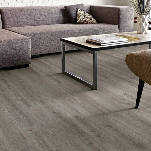 Wood look luxury vinyl plank flooring installed in modern living room