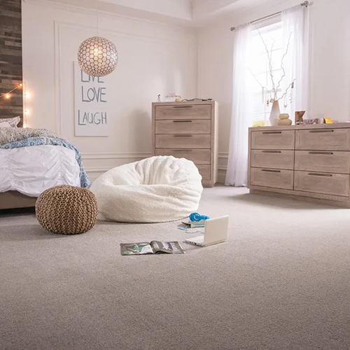 Beautiful textured carpet installed in modern bedroom